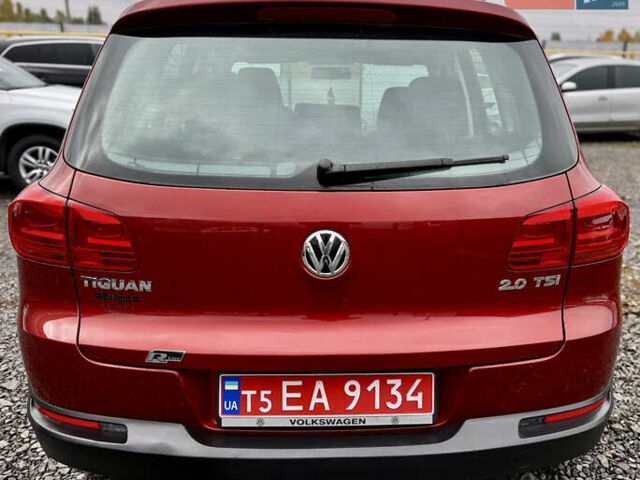 Червоний Фольксваген Тігуан, об'ємом двигуна 2 л та пробігом 140 тис. км за 11100 $, фото 3 на Automoto.ua