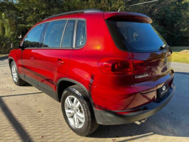 Красный Фольксваген Тигуан, объемом двигателя 2 л и пробегом 76 тыс. км за 2400 $, фото 4 на Automoto.ua