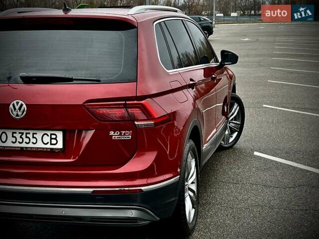 Красный Фольксваген Тигуан, объемом двигателя 1.98 л и пробегом 220 тыс. км за 19900 $, фото 16 на Automoto.ua