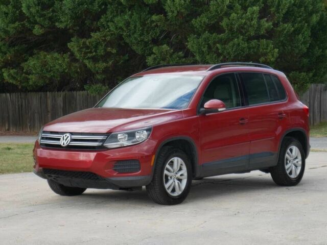 Червоний Фольксваген Тігуан, об'ємом двигуна 2 л та пробігом 80 тис. км за 7200 $, фото 2 на Automoto.ua