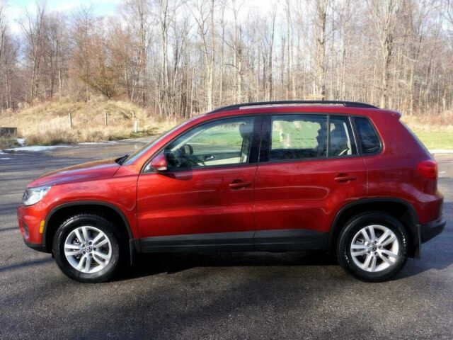 Красный Фольксваген Тигуан, объемом двигателя 2 л и пробегом 79 тыс. км за 7000 $, фото 2 на Automoto.ua