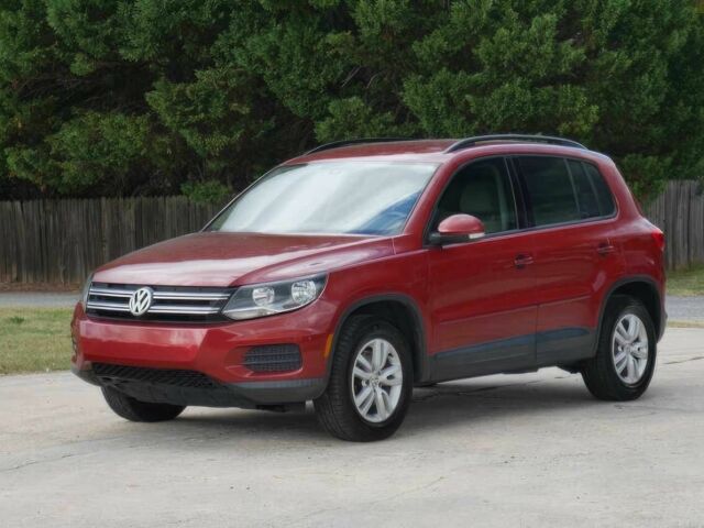 Червоний Фольксваген Тігуан, об'ємом двигуна 2 л та пробігом 79 тис. км за 7200 $, фото 2 на Automoto.ua