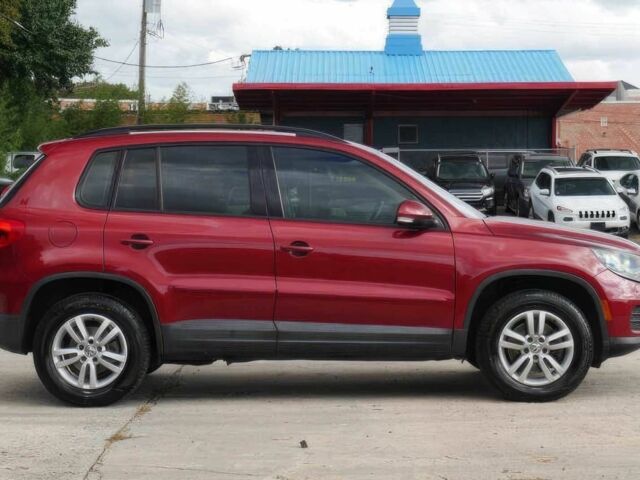 Червоний Фольксваген Тігуан, об'ємом двигуна 2 л та пробігом 79 тис. км за 7200 $, фото 3 на Automoto.ua