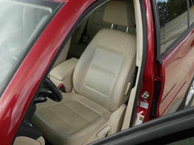 Червоний Фольксваген Тігуан, об'ємом двигуна 2 л та пробігом 79 тис. км за 7200 $, фото 9 на Automoto.ua