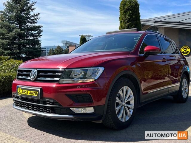 Красный Фольксваген Тигуан, объемом двигателя 2 л и пробегом 225 тыс. км за 18700 $, фото 2 на Automoto.ua