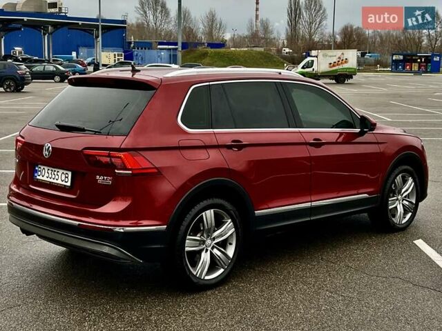 Красный Фольксваген Тигуан, объемом двигателя 1.98 л и пробегом 220 тыс. км за 19900 $, фото 5 на Automoto.ua