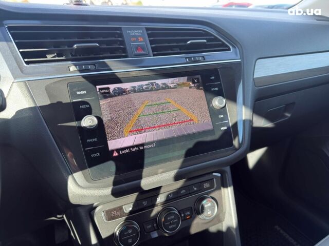 Красный Фольксваген Тигуан, объемом двигателя 2 л и пробегом 70 тыс. км за 17490 $, фото 18 на Automoto.ua