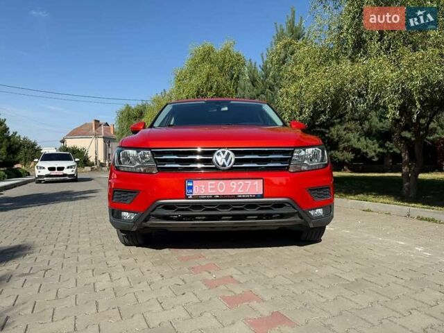 Червоний Фольксваген Тігуан, об'ємом двигуна 2 л та пробігом 133 тис. км за 26400 $, фото 2 на Automoto.ua