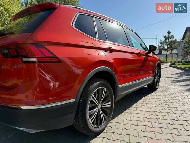 Червоний Фольксваген Тігуан, об'ємом двигуна 2 л та пробігом 133 тис. км за 26400 $, фото 3 на Automoto.ua