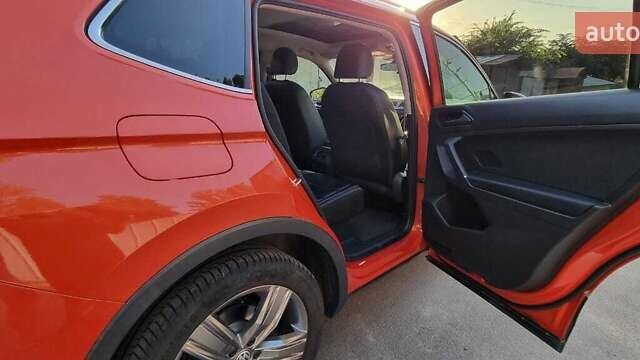 Красный Фольксваген Тигуан, объемом двигателя 1.98 л и пробегом 65 тыс. км за 23500 $, фото 5 на Automoto.ua