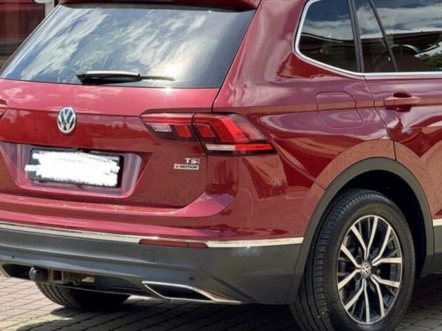 Красный Фольксваген Тигуан, объемом двигателя 2 л и пробегом 90 тыс. км за 367 $, фото 3 на Automoto.ua