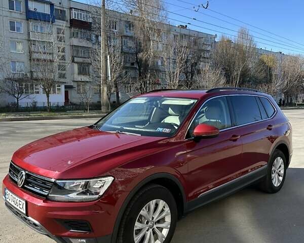 Красный Фольксваген Тигуан, объемом двигателя 1.98 л и пробегом 113 тыс. км за 17850 $, фото 1 на Automoto.ua