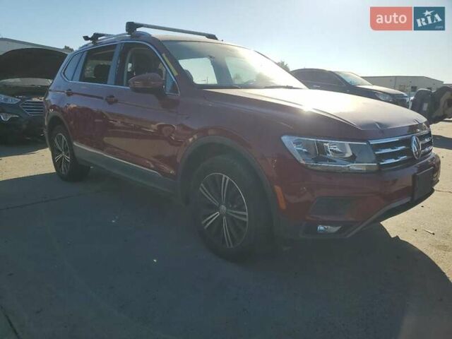 Червоний Фольксваген Тігуан, об'ємом двигуна 1.98 л та пробігом 105 тис. км за 10000 $, фото 4 на Automoto.ua