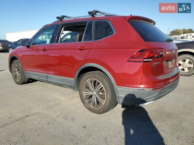 Червоний Фольксваген Тігуан, об'ємом двигуна 1.98 л та пробігом 105 тис. км за 10000 $, фото 1 на Automoto.ua