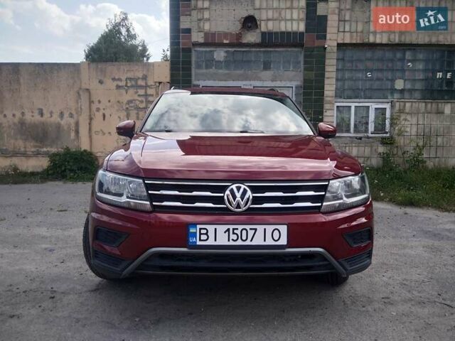 Красный Фольксваген Тигуан, объемом двигателя 1.98 л и пробегом 113 тыс. км за 16500 $, фото 1 на Automoto.ua