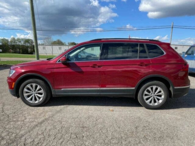 Червоний Фольксваген Тігуан, об'ємом двигуна 2 л та пробігом 49 тис. км за 9850 $, фото 4 на Automoto.ua