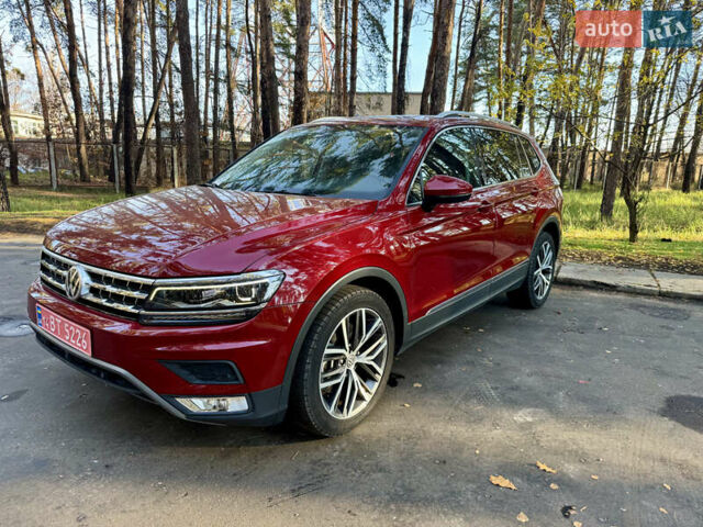 Красный Фольксваген Тигуан, объемом двигателя 2 л и пробегом 91 тыс. км за 18900 $, фото 2 на Automoto.ua
