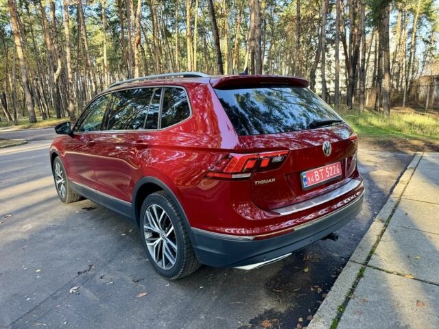 Червоний Фольксваген Тігуан, об'ємом двигуна 2 л та пробігом 91 тис. км за 18900 $, фото 4 на Automoto.ua