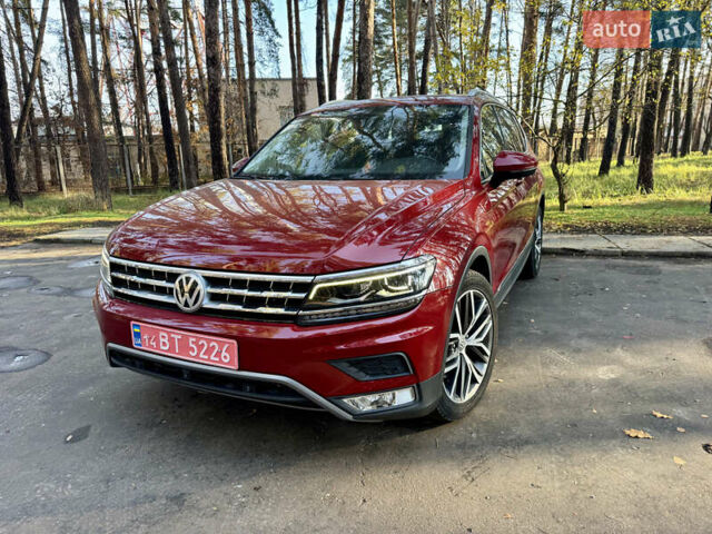 Красный Фольксваген Тигуан, объемом двигателя 2 л и пробегом 91 тыс. км за 18900 $, фото 1 на Automoto.ua