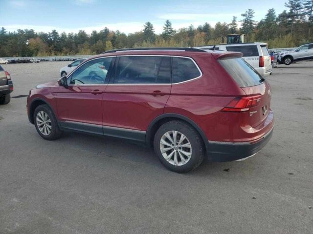 Красный Фольксваген Тигуан, объемом двигателя 2 л и пробегом 78 тыс. км за 3900 $, фото 1 на Automoto.ua