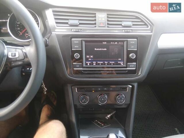 Красный Фольксваген Тигуан, объемом двигателя 1.98 л и пробегом 113 тыс. км за 16500 $, фото 10 на Automoto.ua