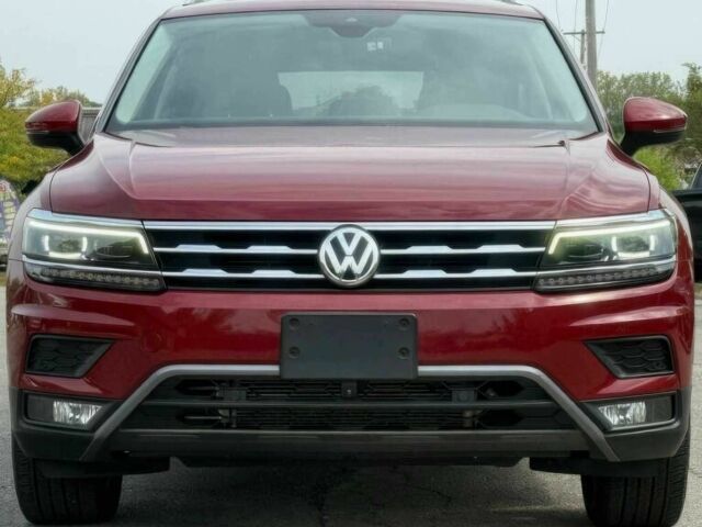 Красный Фольксваген Тигуан, объемом двигателя 2 л и пробегом 40 тыс. км за 11100 $, фото 1 на Automoto.ua