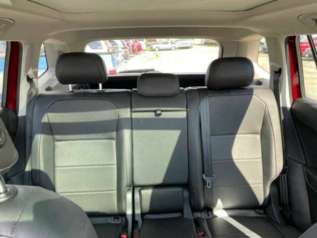 Червоний Фольксваген Тігуан, об'ємом двигуна 2 л та пробігом 49 тис. км за 9850 $, фото 12 на Automoto.ua