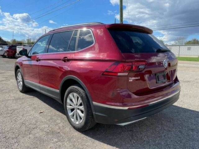 Червоний Фольксваген Тігуан, об'ємом двигуна 2 л та пробігом 49 тис. км за 9850 $, фото 7 на Automoto.ua