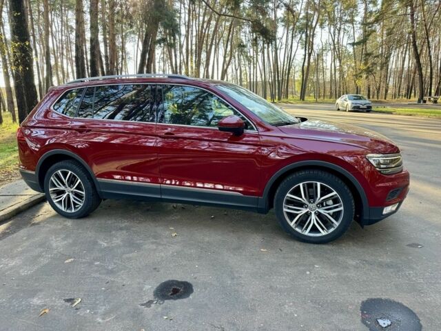 Червоний Фольксваген Тігуан, об'ємом двигуна 2 л та пробігом 91 тис. км за 18900 $, фото 3 на Automoto.ua