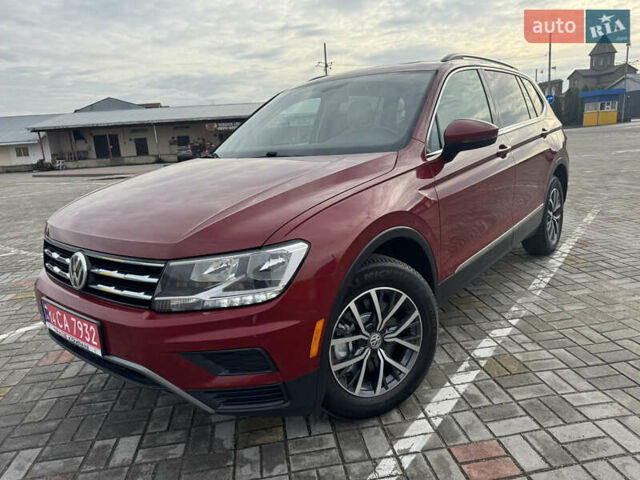 Червоний Фольксваген Тігуан, об'ємом двигуна 1.98 л та пробігом 176 тис. км за 16988 $, фото 7 на Automoto.ua