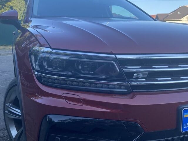 Красный Фольксваген Тигуан, объемом двигателя 2 л и пробегом 282 тыс. км за 26000 $, фото 3 на Automoto.ua