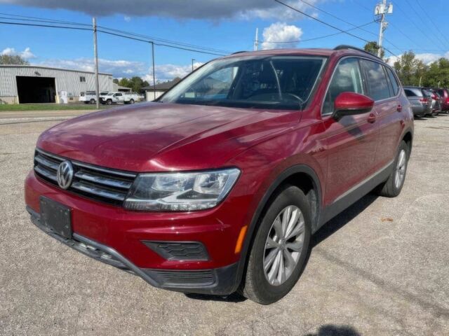 Червоний Фольксваген Тігуан, об'ємом двигуна 2 л та пробігом 49 тис. км за 9850 $, фото 2 на Automoto.ua