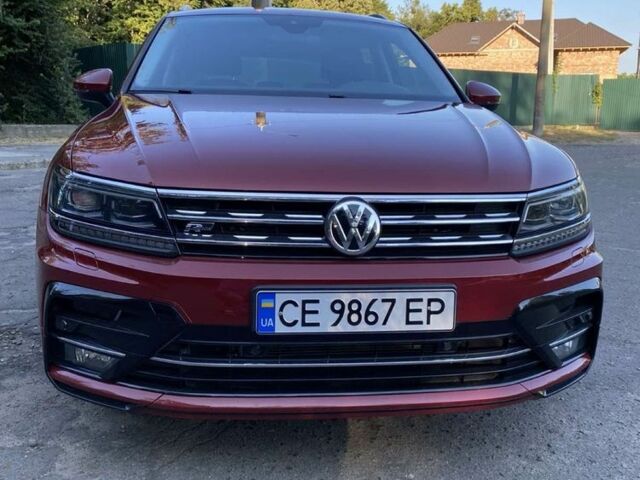 Красный Фольксваген Тигуан, объемом двигателя 2 л и пробегом 282 тыс. км за 26000 $, фото 2 на Automoto.ua