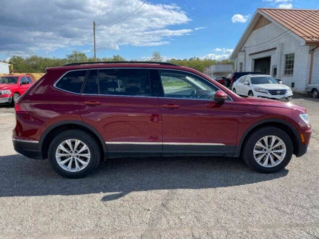 Червоний Фольксваген Тігуан, об'ємом двигуна 2 л та пробігом 49 тис. км за 9850 $, фото 3 на Automoto.ua