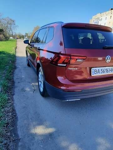 Червоний Фольксваген Тігуан, об'ємом двигуна 1.98 л та пробігом 124 тис. км за 22500 $, фото 12 на Automoto.ua