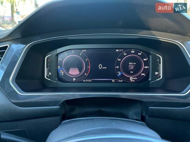 Красный Фольксваген Тигуан, объемом двигателя 2 л и пробегом 115 тыс. км за 20500 $, фото 4 на Automoto.ua