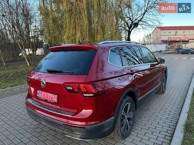 Красный Фольксваген Тигуан, объемом двигателя 2 л и пробегом 115 тыс. км за 20500 $, фото 1 на Automoto.ua