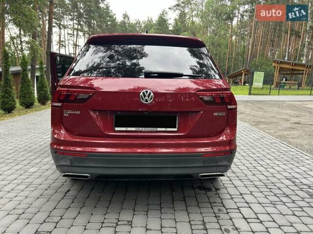 Червоний Фольксваген Тігуан, об'ємом двигуна 1.98 л та пробігом 140 тис. км за 17499 $, фото 6 на Automoto.ua