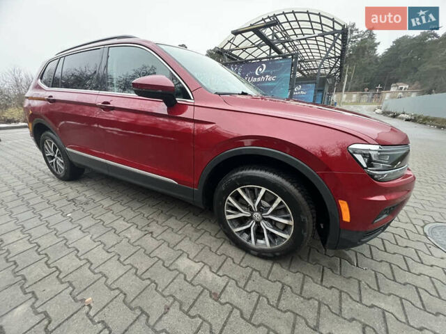 Красный Фольксваген Тигуан, объемом двигателя 1.98 л и пробегом 150 тыс. км за 19200 $, фото 1 на Automoto.ua