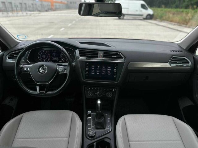 Красный Фольксваген Тигуан, объемом двигателя 2 л и пробегом 145 тыс. км за 20990 $, фото 14 на Automoto.ua