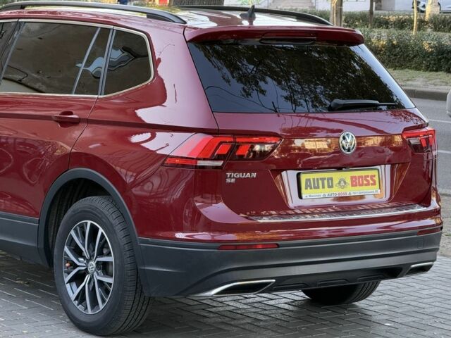 Червоний Фольксваген Тігуан, об'ємом двигуна 2 л та пробігом 99 тис. км за 20800 $, фото 17 на Automoto.ua