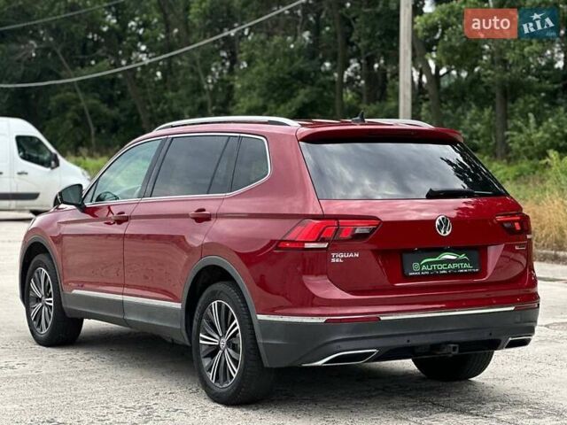 Красный Фольксваген Тигуан, объемом двигателя 2 л и пробегом 145 тыс. км за 19990 $, фото 6 на Automoto.ua