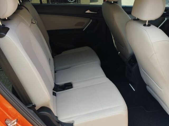 Червоний Фольксваген Тігуан, об'ємом двигуна 2 л та пробігом 104 тис. км за 16200 $, фото 5 на Automoto.ua