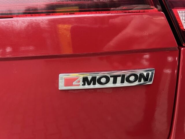 Красный Фольксваген Тигуан, объемом двигателя 2 л и пробегом 150 тыс. км за 19300 $, фото 2 на Automoto.ua