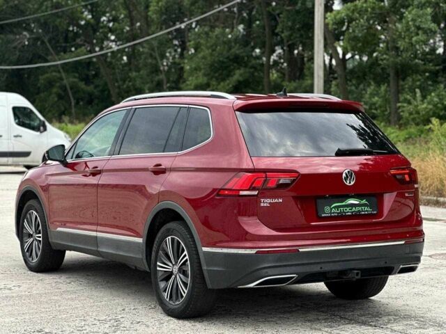 Красный Фольксваген Тигуан, объемом двигателя 2 л и пробегом 145 тыс. км за 20990 $, фото 4 на Automoto.ua