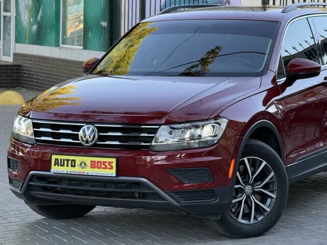 Червоний Фольксваген Тігуан, об'ємом двигуна 2 л та пробігом 99 тис. км за 20800 $, фото 4 на Automoto.ua