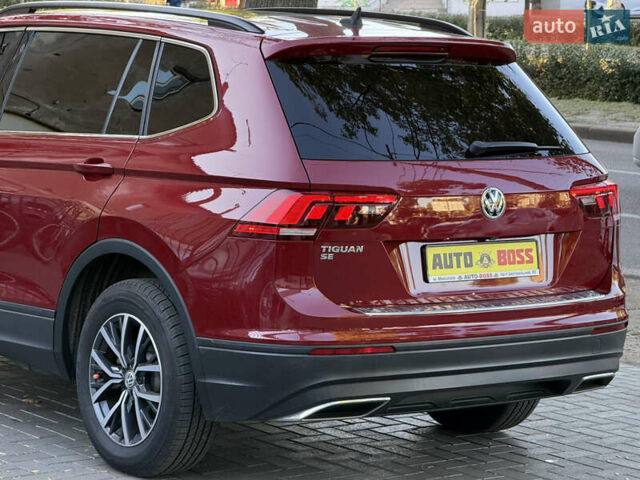 Червоний Фольксваген Тігуан, об'ємом двигуна 1.98 л та пробігом 99 тис. км за 20300 $, фото 17 на Automoto.ua