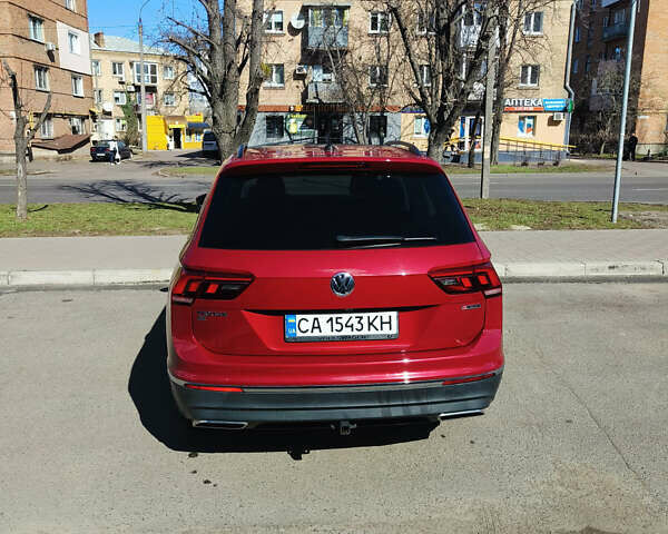 Червоний Фольксваген Тігуан, об'ємом двигуна 1.98 л та пробігом 62 тис. км за 23000 $, фото 2 на Automoto.ua