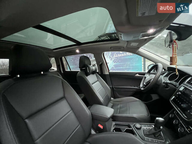 Красный Фольксваген Тигуан, объемом двигателя 1.98 л и пробегом 150 тыс. км за 19200 $, фото 26 на Automoto.ua