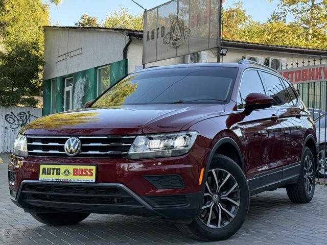 Червоний Фольксваген Тігуан, об'ємом двигуна 2 л та пробігом 99 тис. км за 20800 $, фото 1 на Automoto.ua